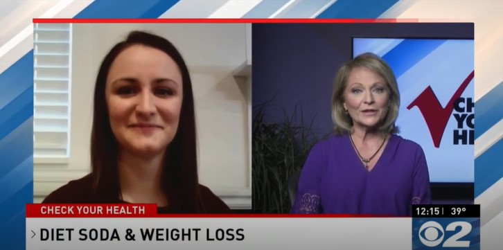 Two women talking about diet soda and weight loss