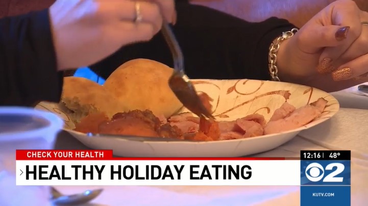 a woman eating during the holidays