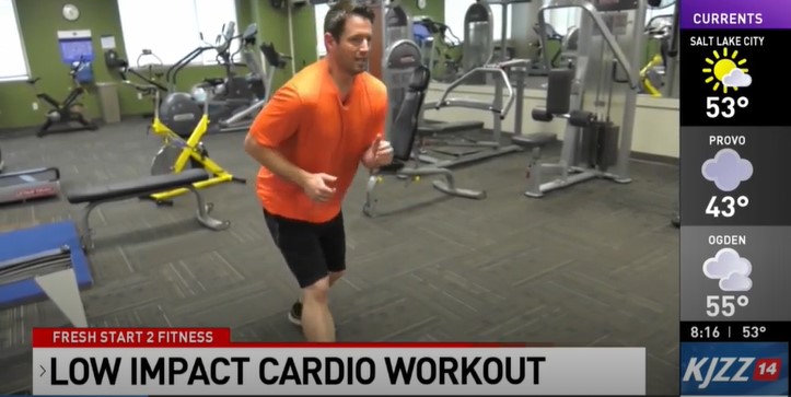 A man demonstrating low impact cardio workout