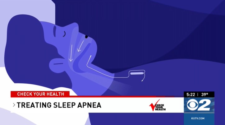 A man lying in bed with sleep apnea